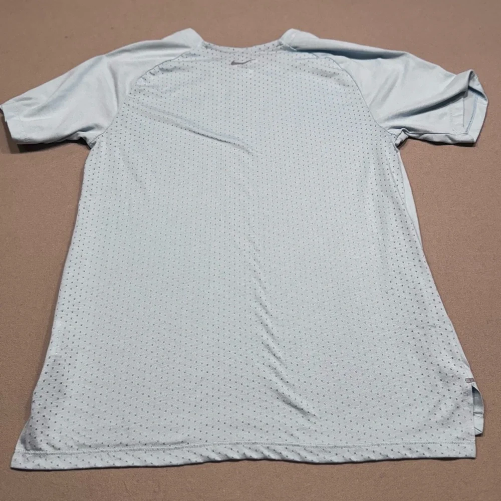 Nike Women's Light Blue Dri-Fit Short Sleeve Tee